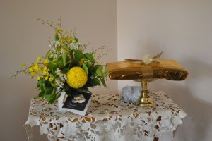 The beautiful flowers for Ayya Vayama's birthday and the cloth material at the End of Rains Cloth Offering Ceremony 2014. Photo by Havindra.