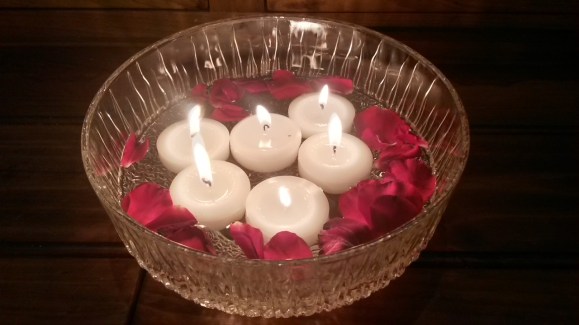 The lights of the floating candles signifying our wish for peace, lovingkindness and understanding to all beings.