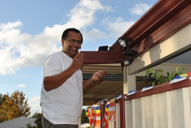 The Volunteer out up the Vesak lanterns, lights and Buddhist flags at Patacara Bhikkhuni Hermitage on Sunday, 15th May 2016. Photo by Manora and Havindra.