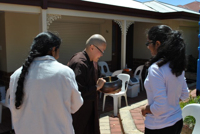 Dana at the End of Rains Cloth Offering Ceremony 2016 at Patacara Bhikkhuni Hermitage. Photo by Havindra.